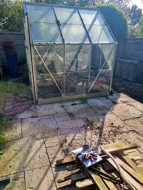 Old greenhouse patio before renovation