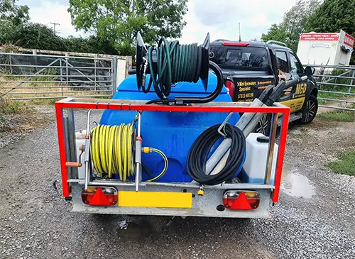 Pressure washing hose reels and equipment on the trailer